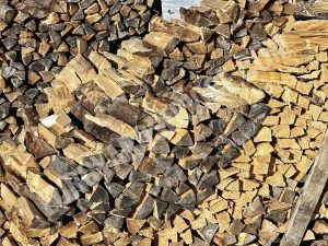 Firewood stacked high